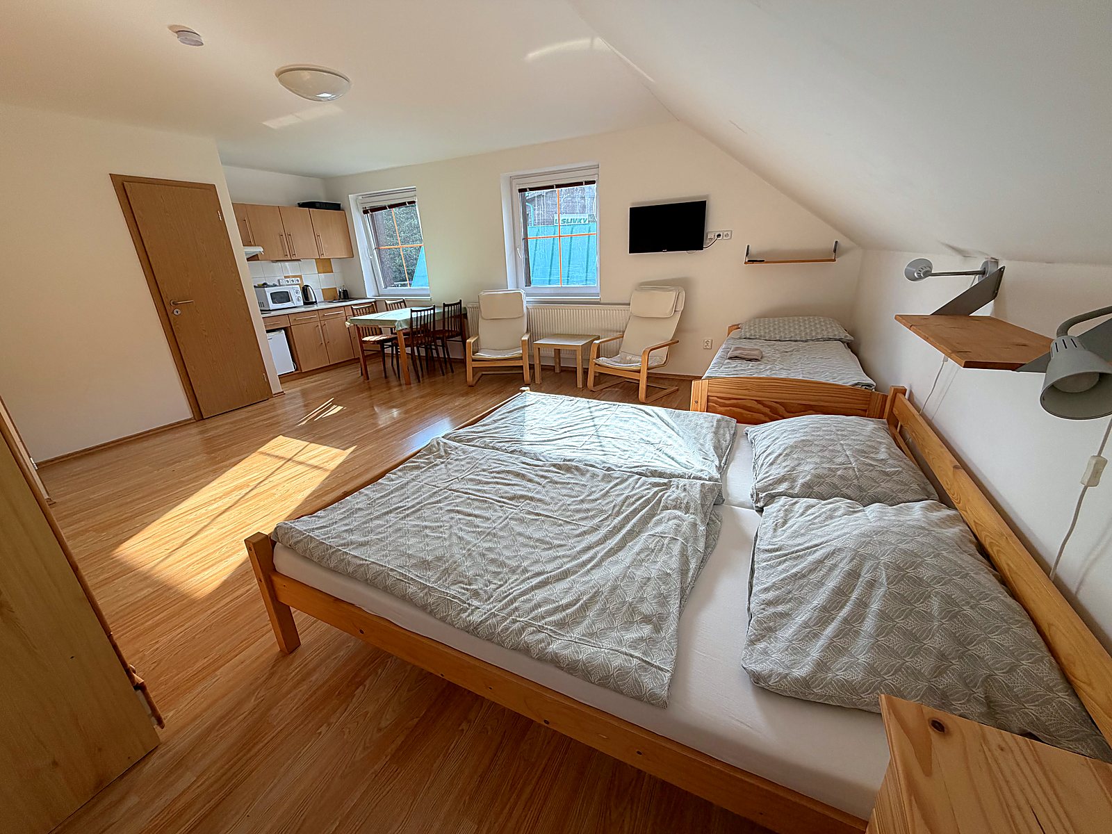 Podkrovní apartmán s kuchyňským koutem